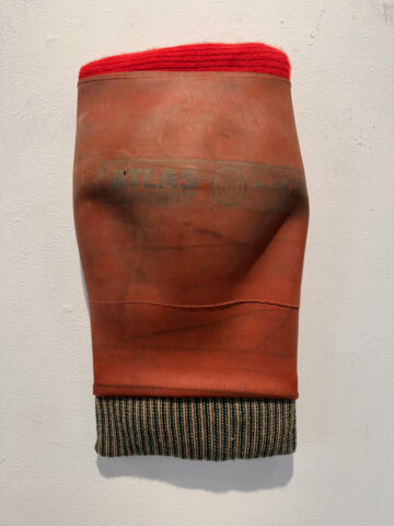 2024 rubber, fabric, on wood 27 x 10 x 2 inches
