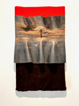 2021 inner tube, fabric, on wood 25 x 16 x 3 inches